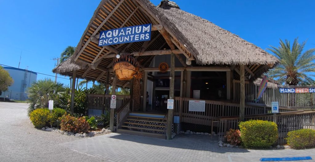 Florida Keys Aquarium Encounters interactive marine exhibits. Building front and parking. FloridaKeysVillas.com