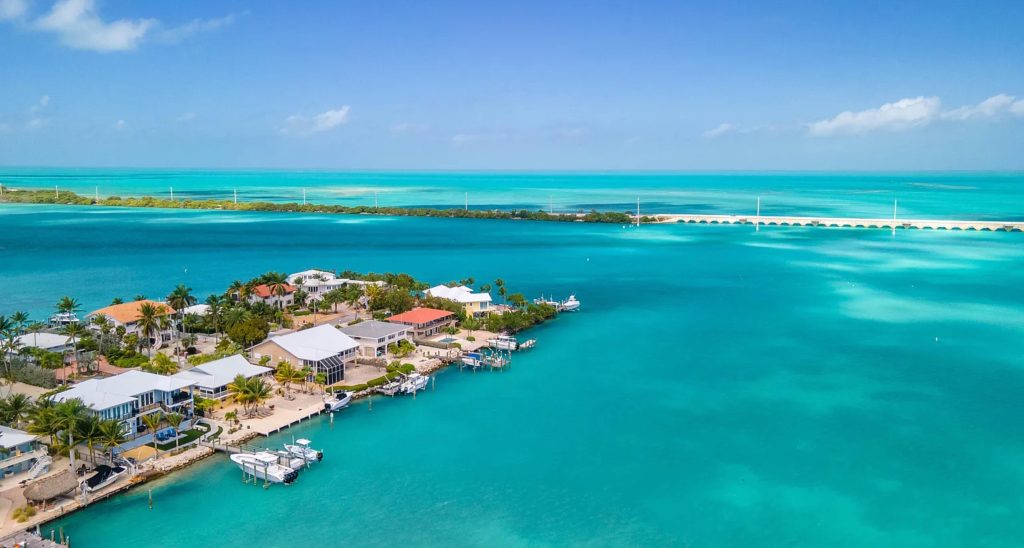 Weekly waterfront vacation home in Marathon Florida with private dock and pool. FloridaKeysVillas.com