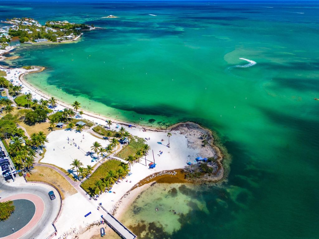 Sombrero Beach aerial photo. Sombrero Beach Marathon Florida aerial view with turquoise water and sandy shoreline. FloridaKeysVillas.com