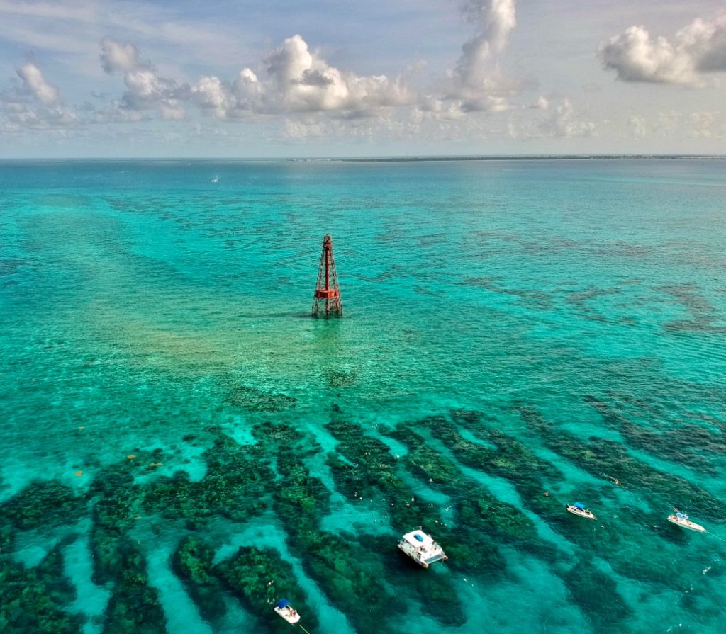 Snorkeling at Sombrero Reef near Marathon Florida. Aerial View on the Sombrero Lighthouse.  FloridaKeysVillas.com