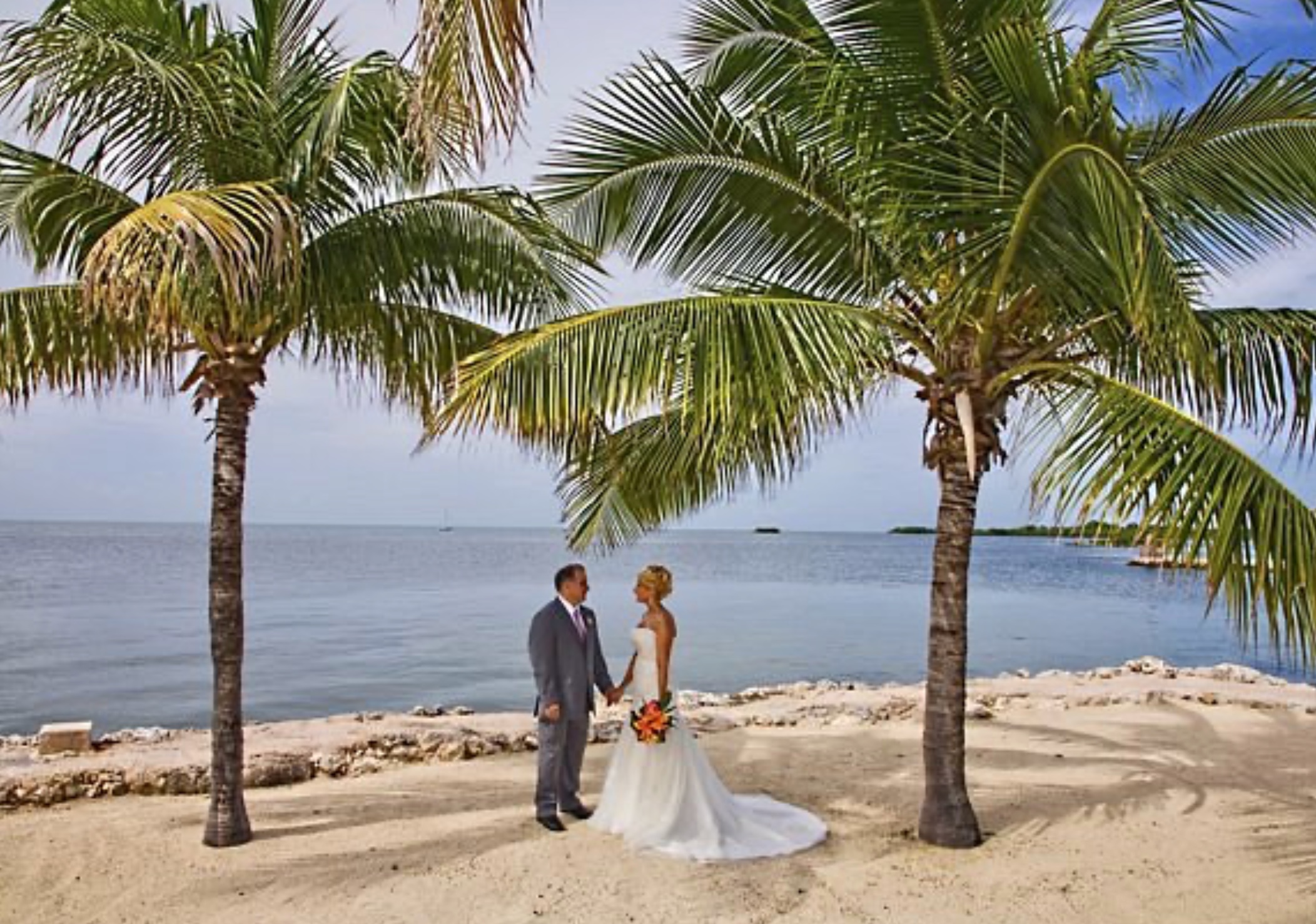 Sombrero Beach with palm trees wedding. FloridaKeysVillas.com
