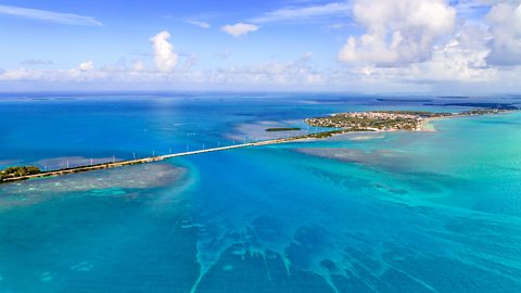 Aerial view of Marathon Florida showing the Overseas Highway and surrounding islands. FloridaKeysVillas.com