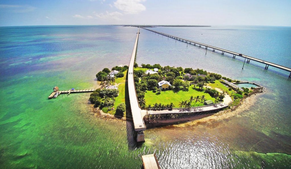Aerial view of Pigeon Keys and the Seven Mile Bridge showing the Overseas Highway. FloridaKeysVillas.com