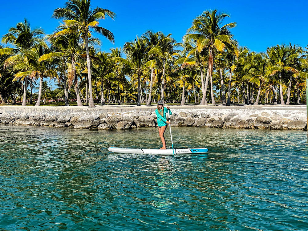 Paddleboarding in calm Florida Keys water. Booking Direct and Save with FloridaKeysVillas.com